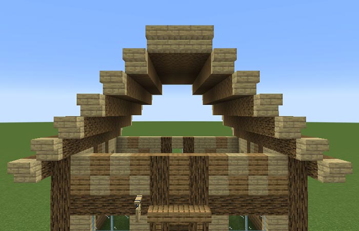 木の根のような装飾付き赤い屋根の家🏚️ A house